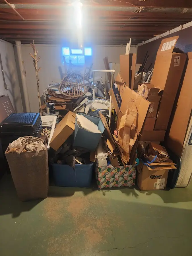 Roll-off dumpster container at job site for Cleanout Dumpster Rental in Oconto